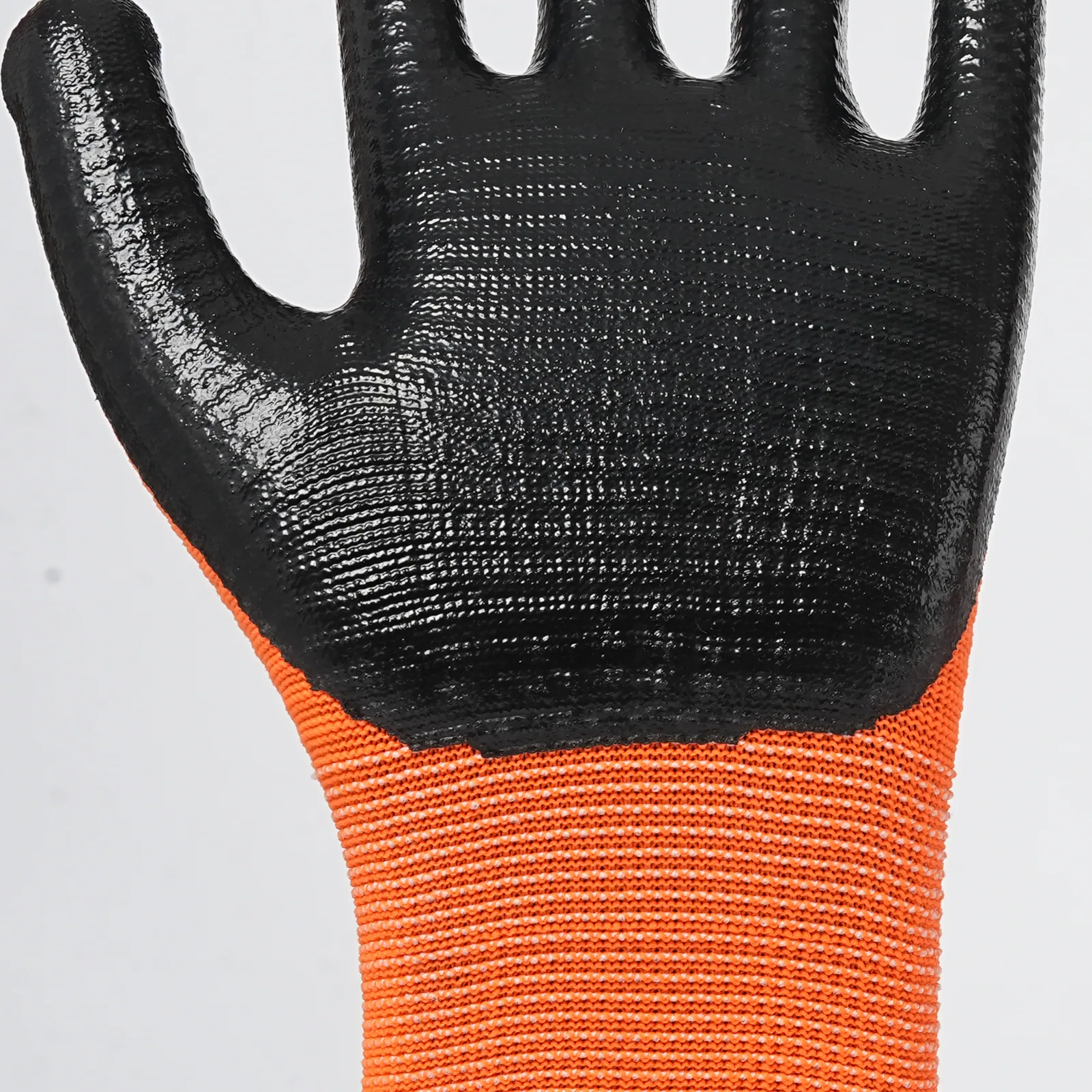 13 Gauge Nitrile Dipped Gloves Nitrile coating and grip texture close-up
